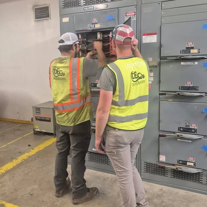Control panel work at a plastic molding plant in Arlington